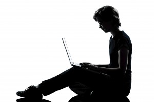 teen at a computer